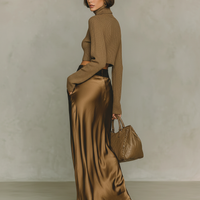 Women's Fashionable Gold-brown Turtleneck Long-sleeved Knit Top Paired With A Satin Midi Skirt MDA0982L5AN